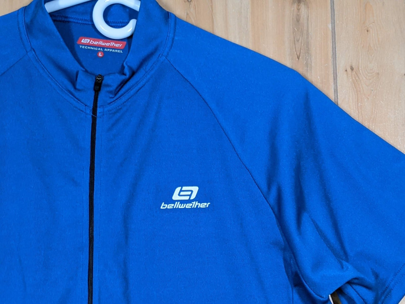 Bellwether Cycling Jersey Mens Large 1/2 Zip Blue Rear Pockets 100% Polyester