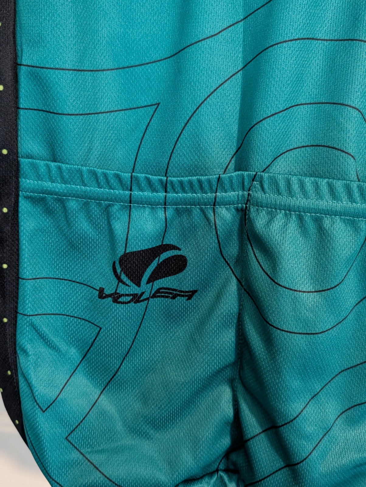 Voler CYCLING SHIRT..Medium..100 Percent Polyester. Zip Front