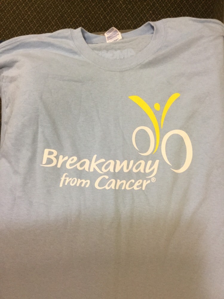 Breakaway From Cancer Women’s Amgen Light Blue Shirt & Wristband Bracelet