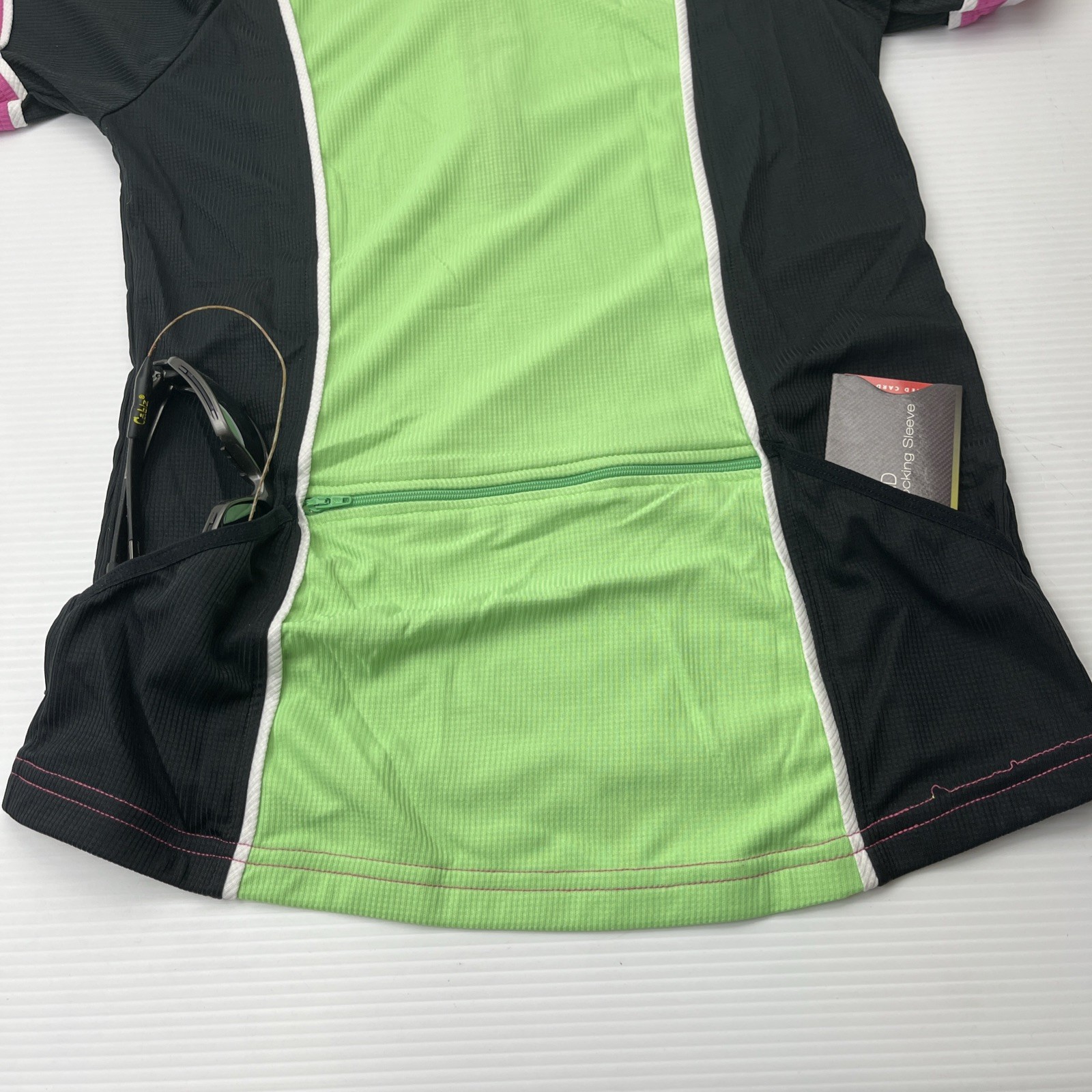 Canari Women’s CYCLING Biking JERSEY Large L Back pockets 1/2 Zip Green Black