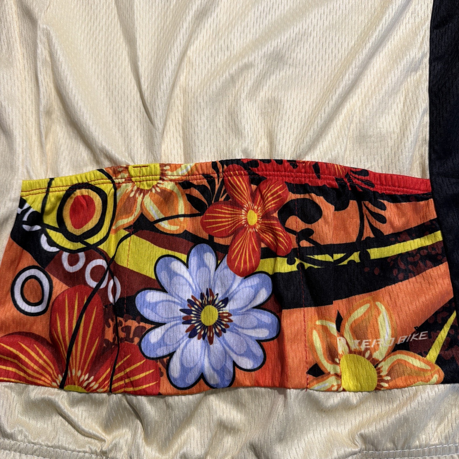 NWT Zero Bike women’s cycling shirt with three back pockets Large Yellow Floral