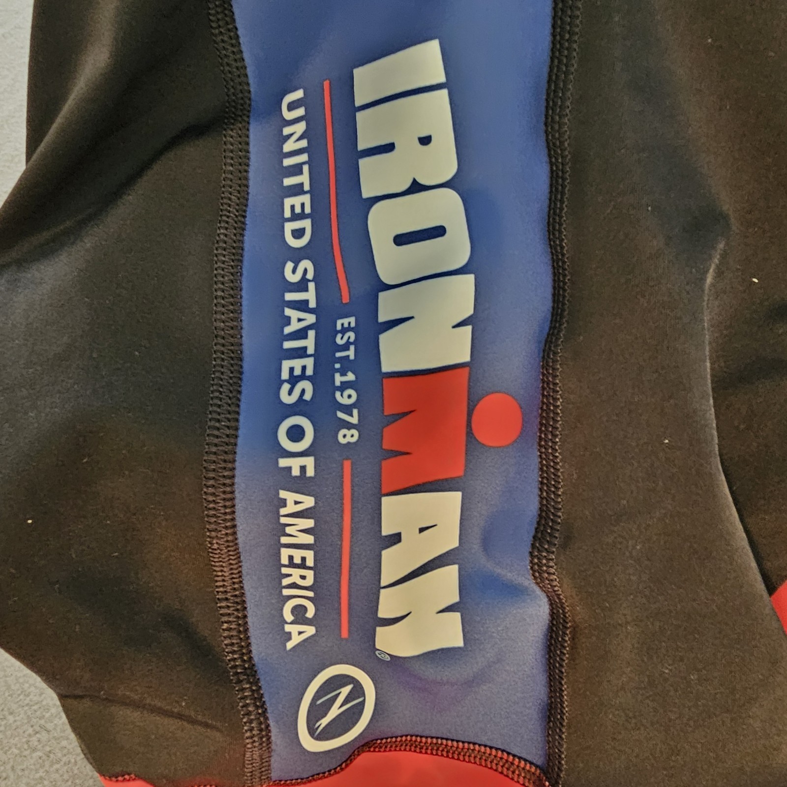 NWOT Zoot Ironman USA Lady’s Zippered Top And Padded Riding Pants Jersey Outfit