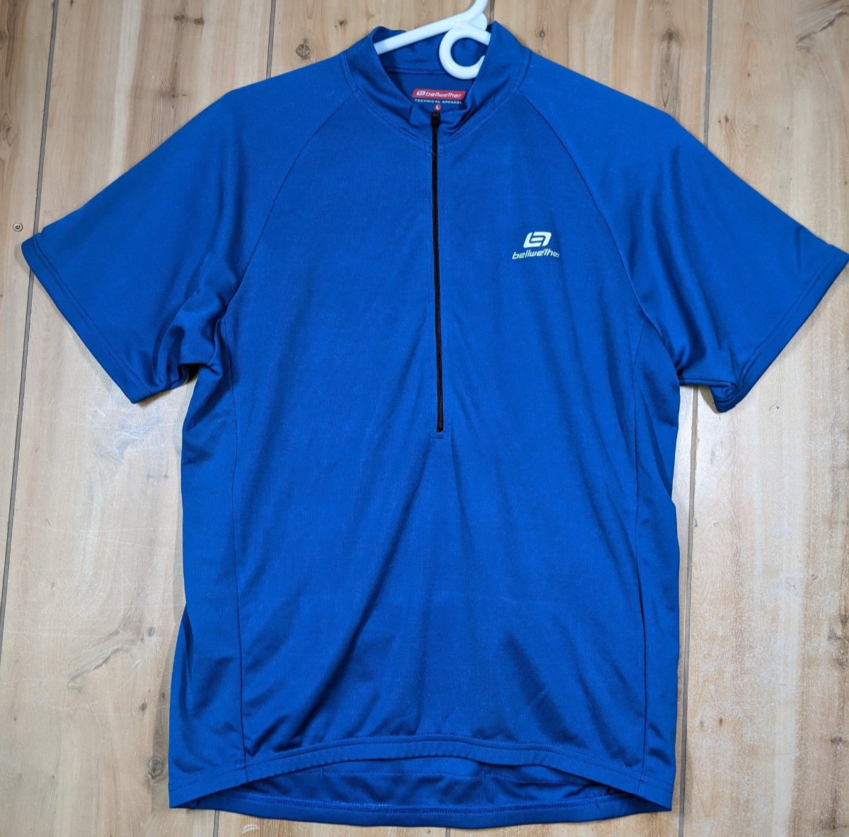 Bellwether Cycling Jersey Mens Large 1/2 Zip Blue Rear Pockets 100% Polyester