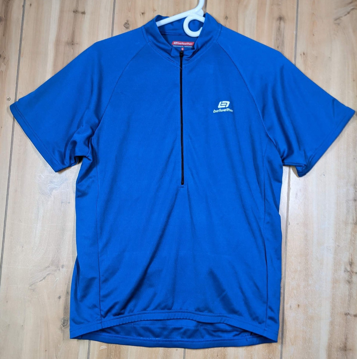 Bellwether Cycling Jersey Mens Large 1/2 Zip Blue Rear Pockets 100% Polyester