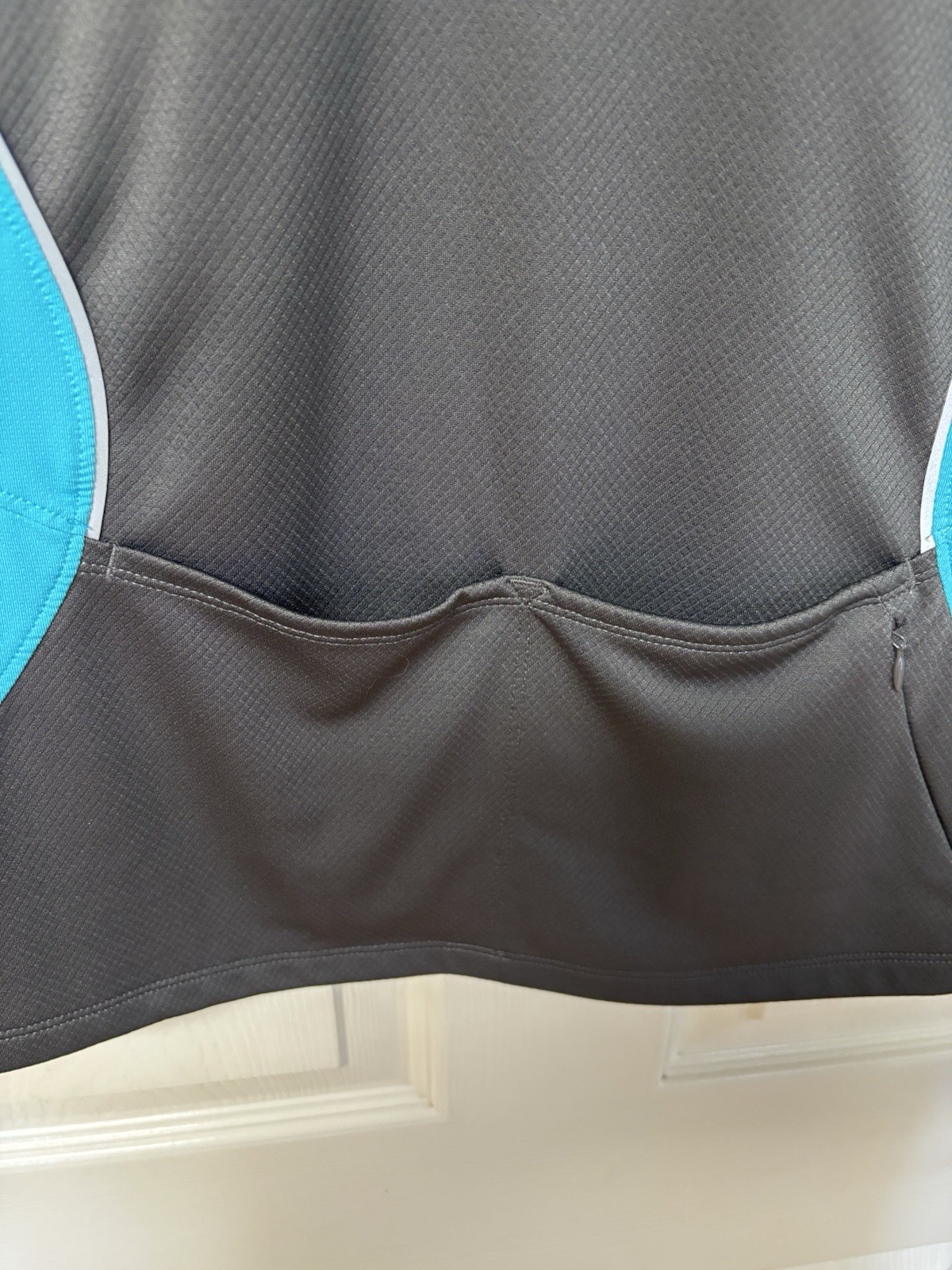 Novara Women’s Gray & Teal Sleeveless Cycling Jersey w/pockets In Back. L