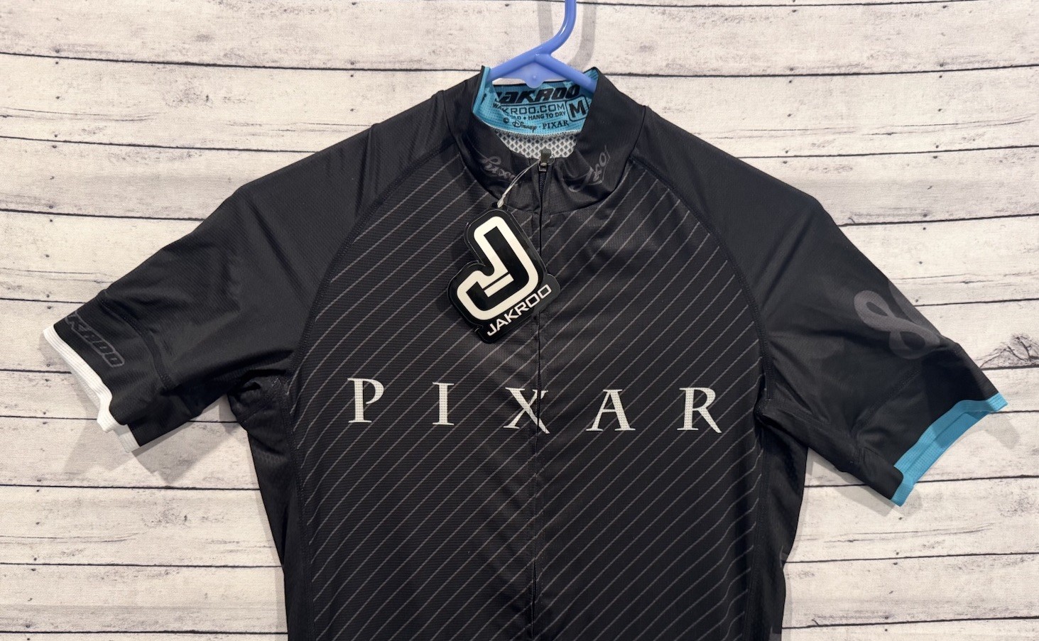 Jakroo x PIXAR Cycling Jersey M Black Blue Full Zip Lightweight Disney NEW NWT