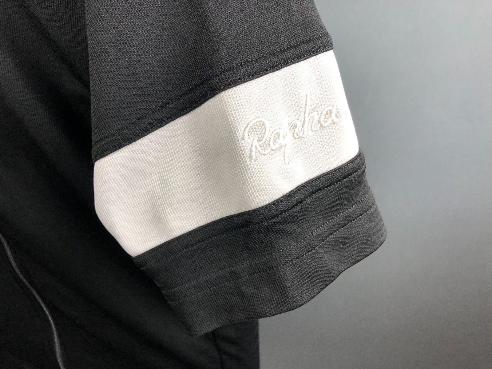 Rapha Women’s Full Zip Cycling Top Black Polyester/Wool Drop Tail