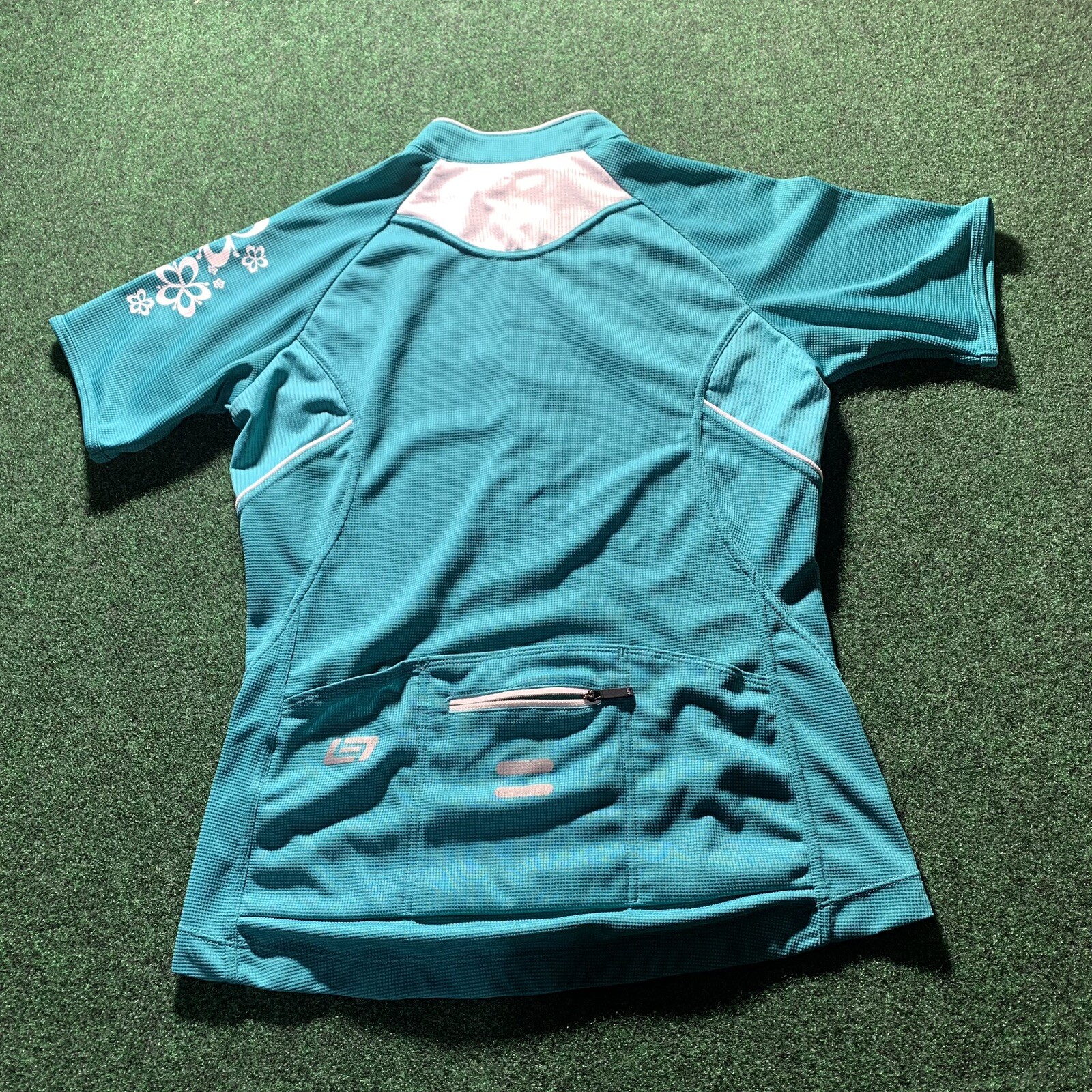 Bellwether Cycling Jersey Women’s Med Cadence Teal White Floral Zip active shirt