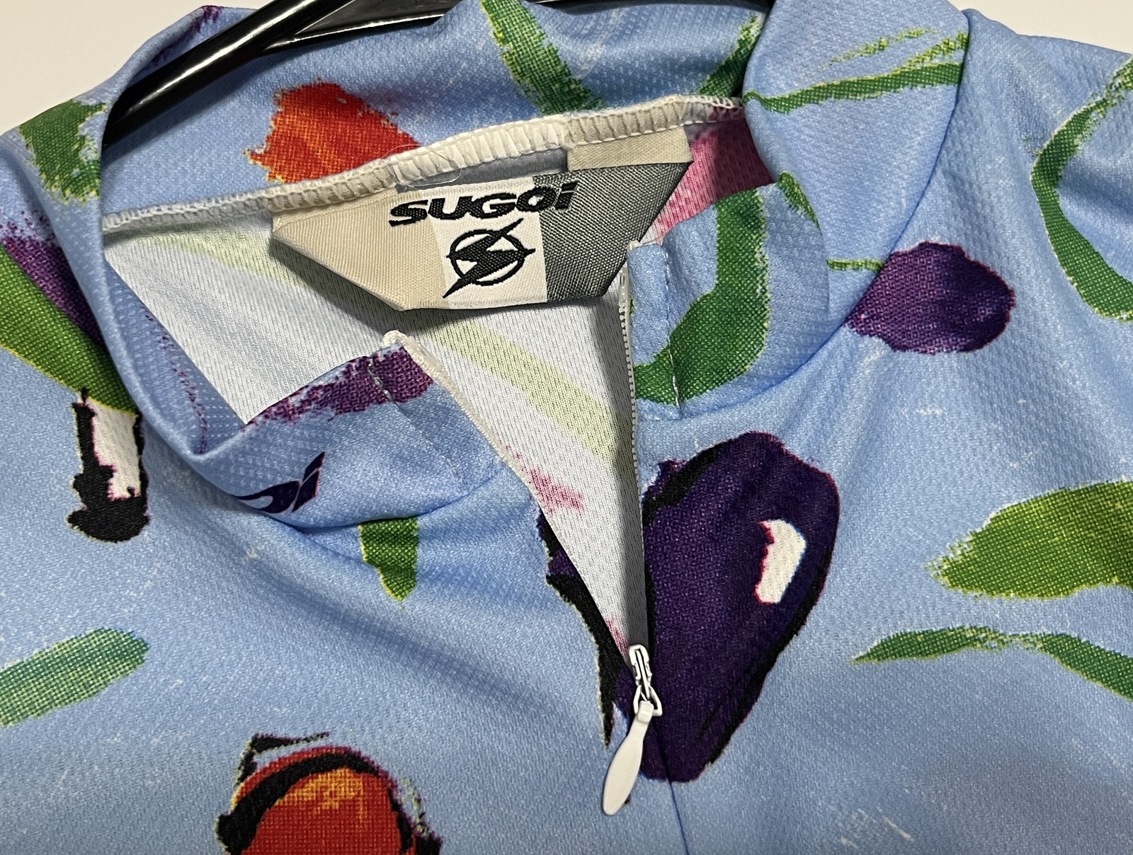 SUGOI Women’s Cycling Jersey Sleeveless Blue Floral Fruit Print Bike Top Medium