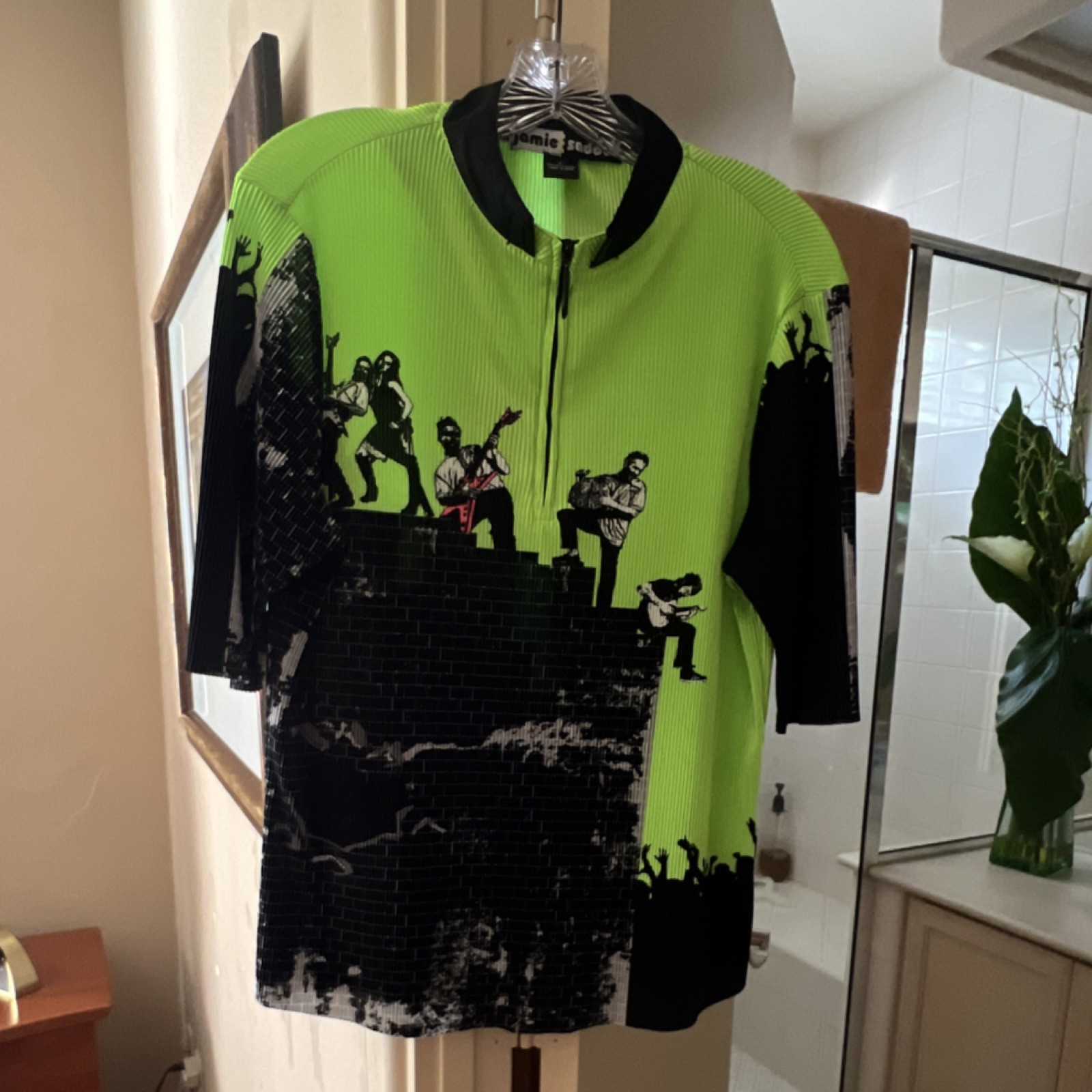Jamie Sadock Green & Black with quarter zip. Women’s large golf shirt. ￼