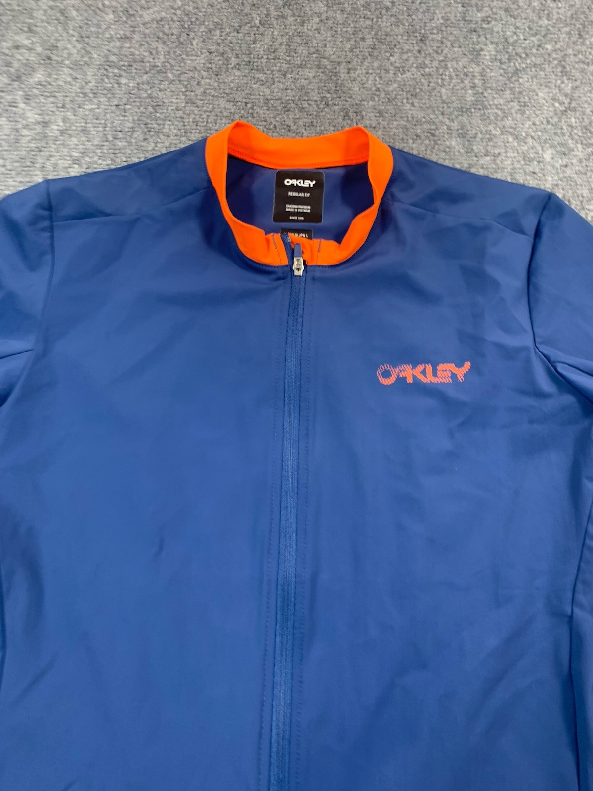 Oakley Shirt Womens Medium Blue Long Sleeve Full Zip Cycling Reflective Stretch