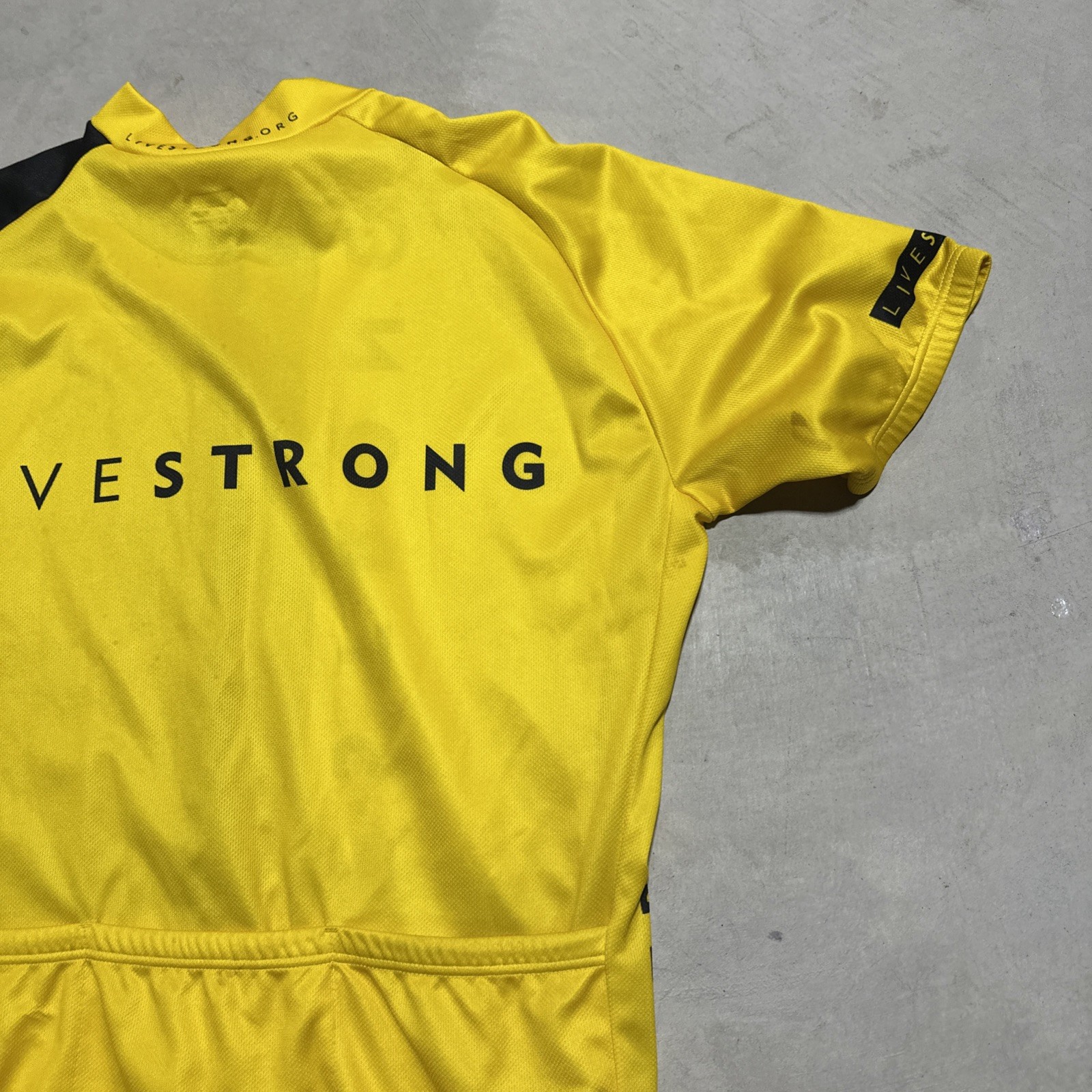 Nike LiveStrong Men’s Black Yellow Cycling Jersey SZ XL Pockets Stretch Italy
