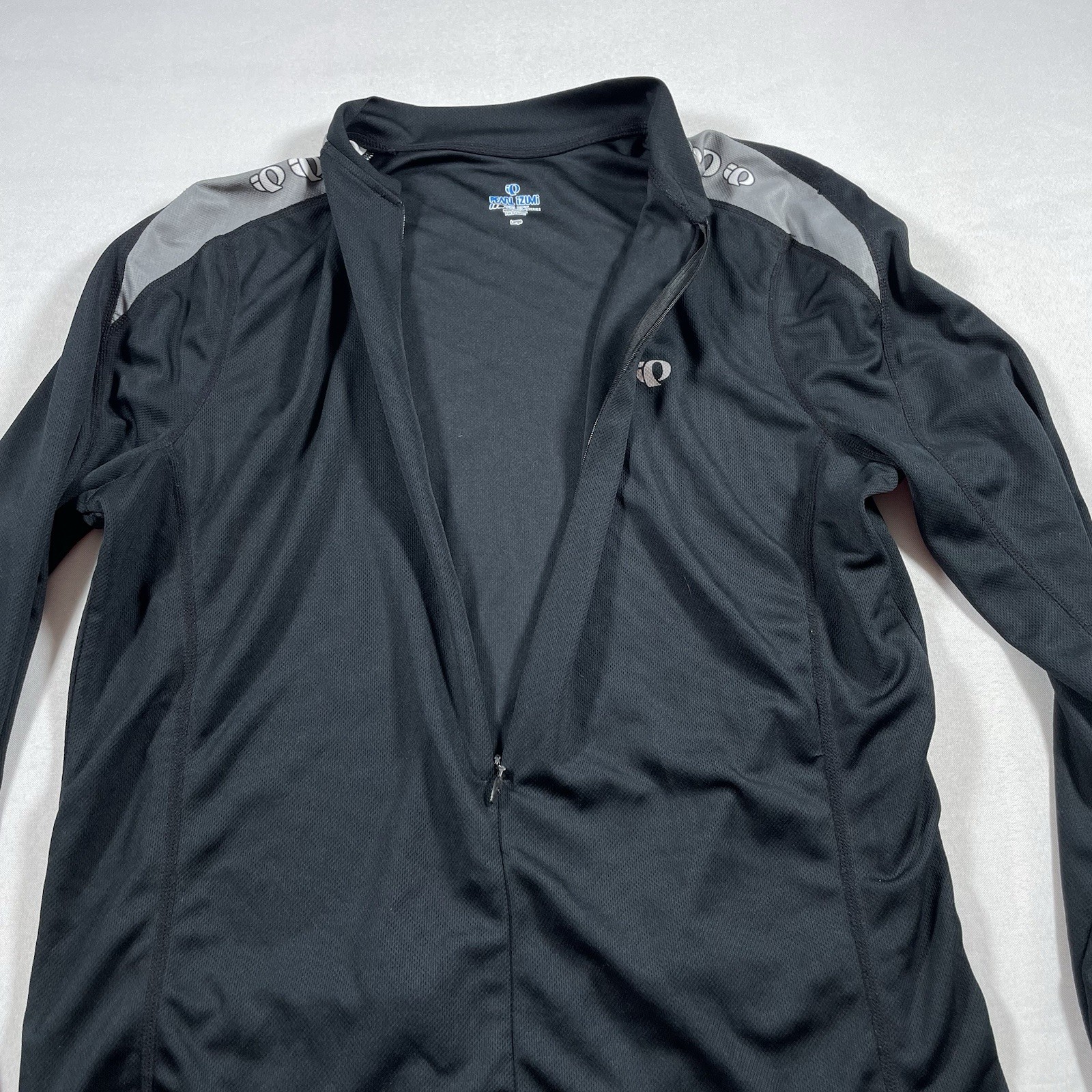 pearl izumi long sleeve cycling jersey 3/4 zip bottle pockets Large