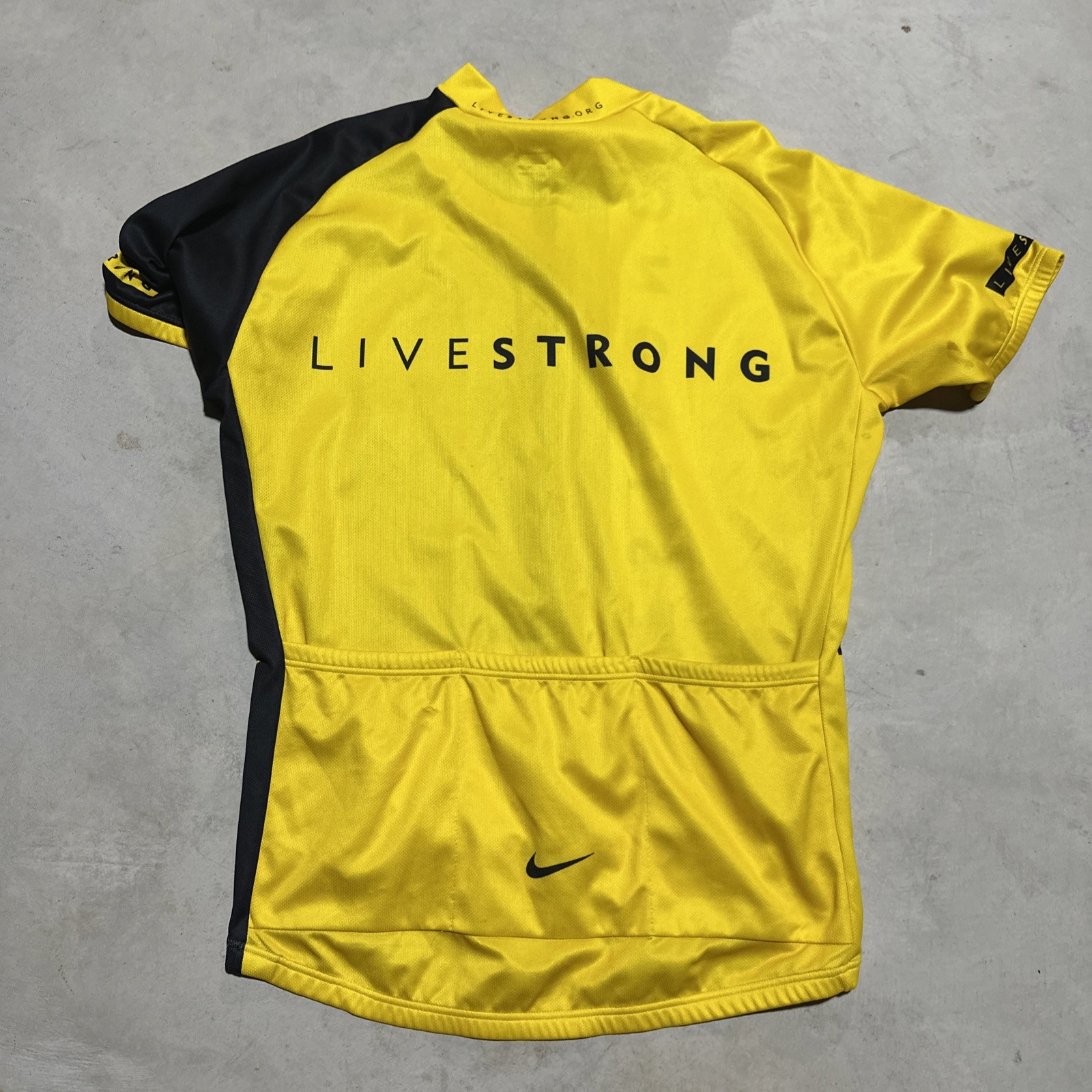 Nike LiveStrong Men’s Black Yellow Cycling Jersey SZ XL Pockets Stretch Italy