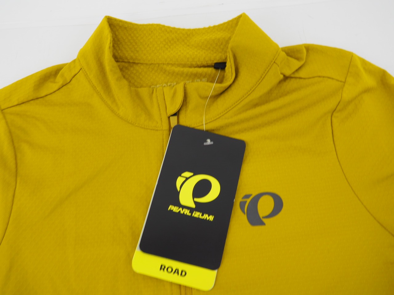 New! Pearl Izumi Attack Thermal Cycling Jersey Women’s Medium Golden Palm