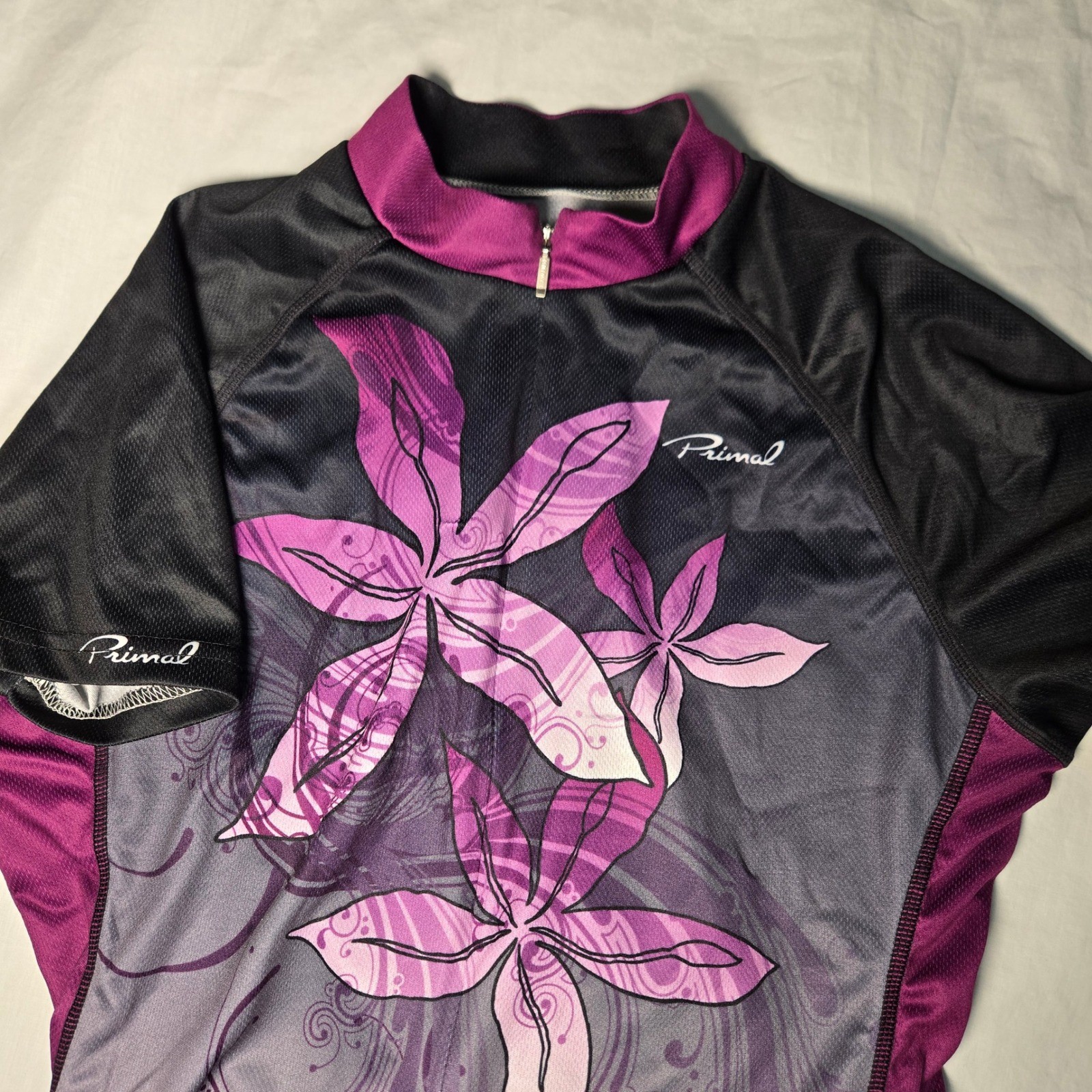 Primal Womens Cycling Jersey Purple Floral Short Sleeve Quarter Zip Size Medium