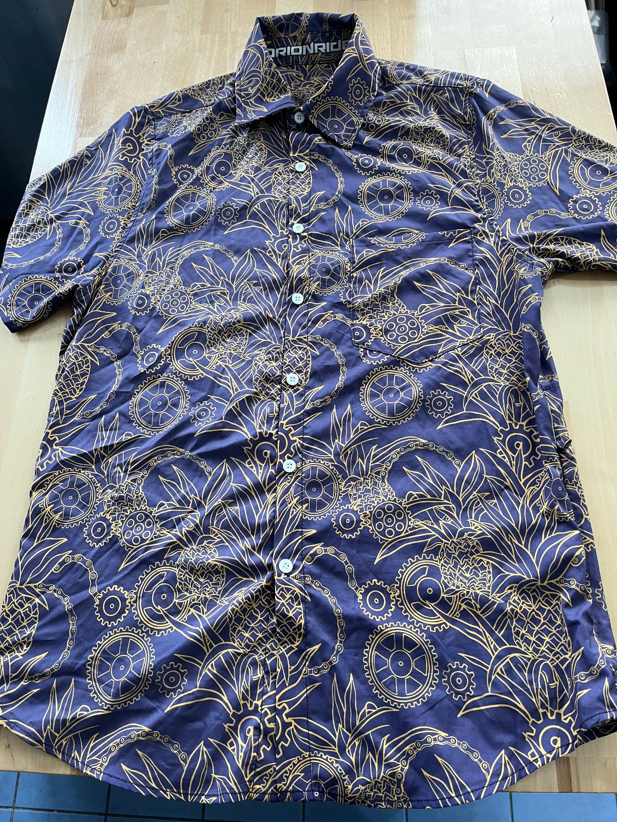 OrionRide Lightweight Cycling Button Down Shirt – Purple Pineapple/Gears Mens S