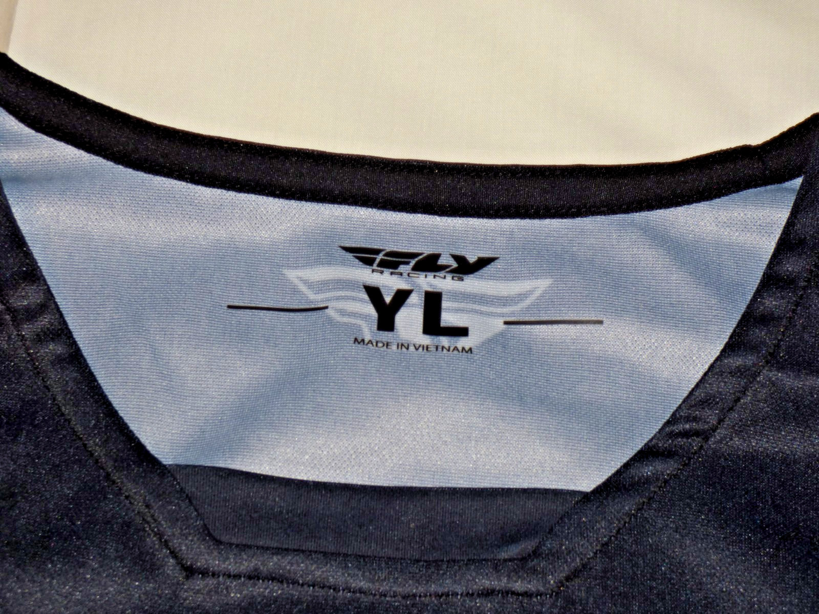 New FLY RACING Youth Large RADIUM Jersey BLACK Pro Fit NIP Bicycle Bike 376-050