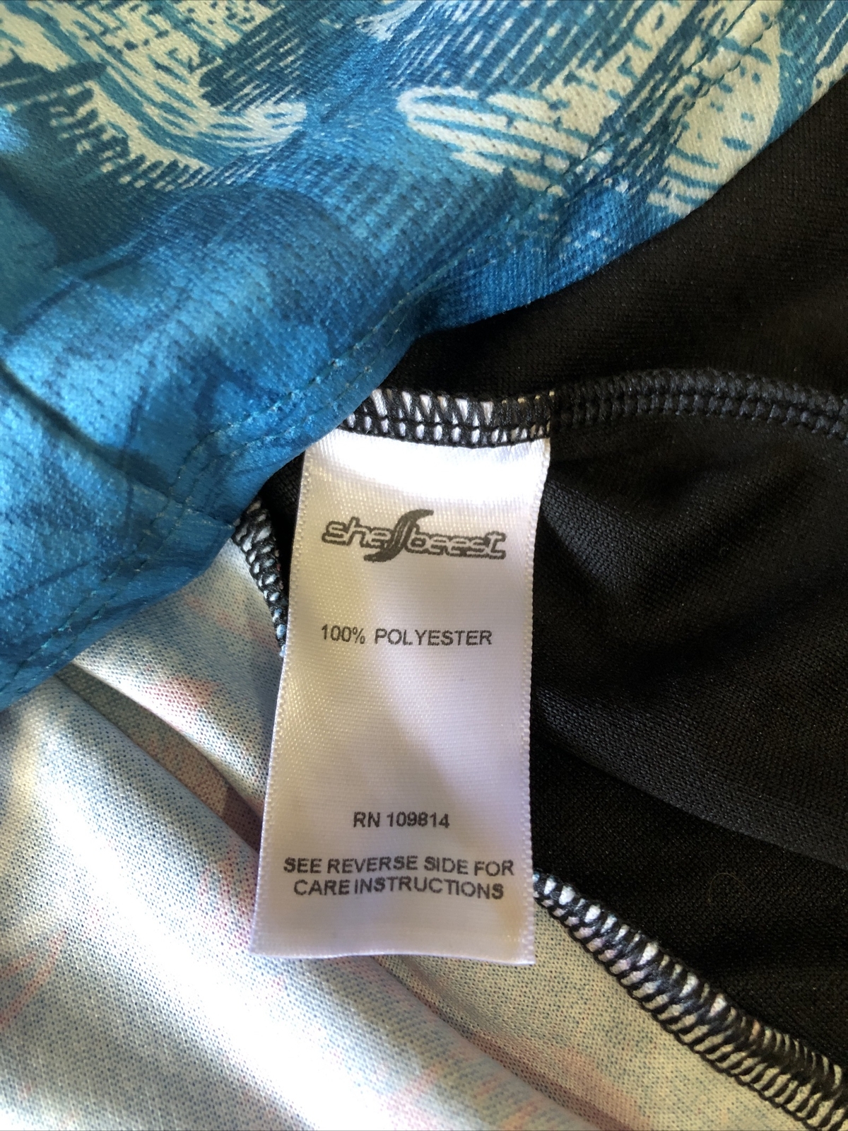 NWOT New SHE BEEST cycling Too LARGE front Zip Back Pockets
