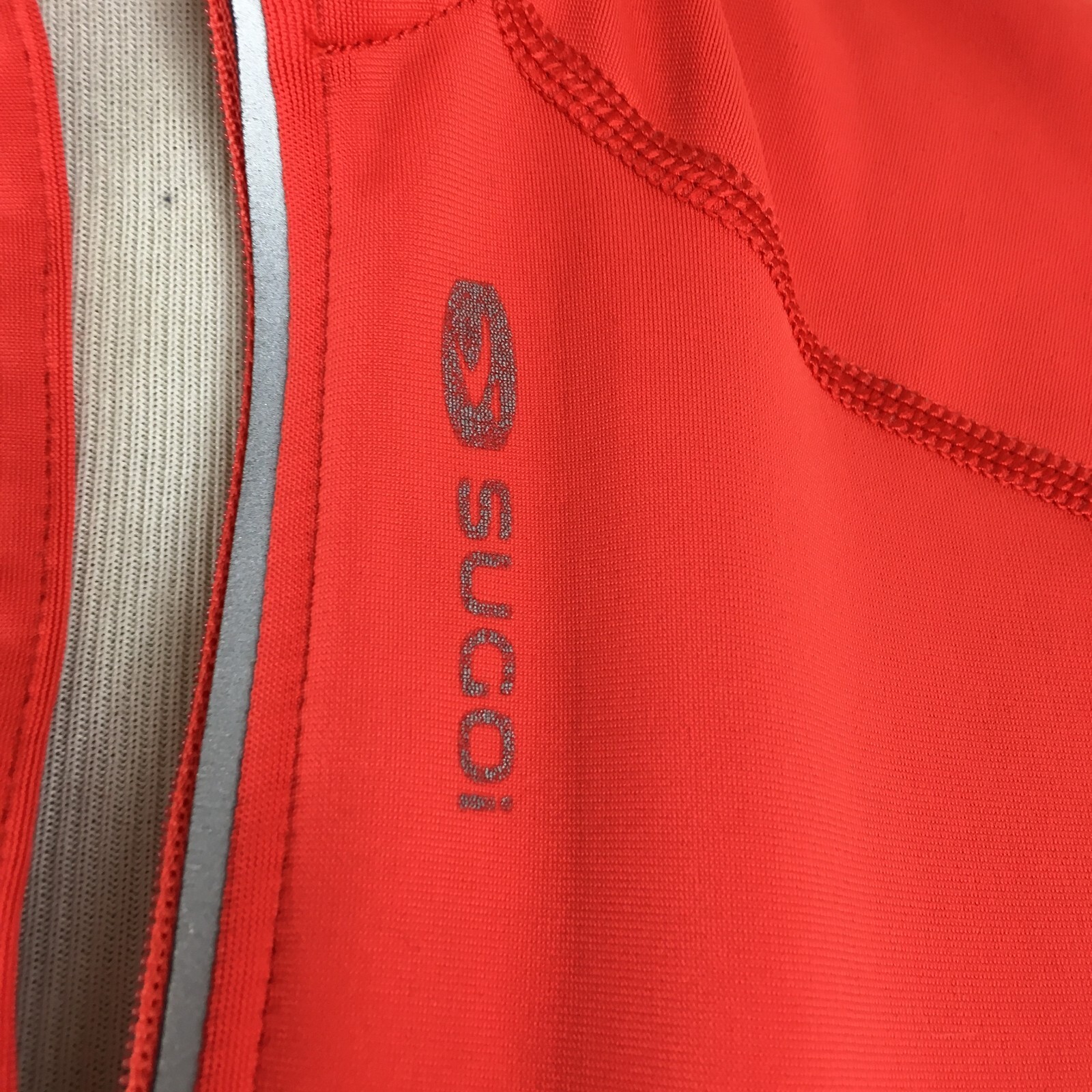 SUGOI sz Small Dark Orange Gray Trim Zip Pocket Cycling Biking Pullover Shirt