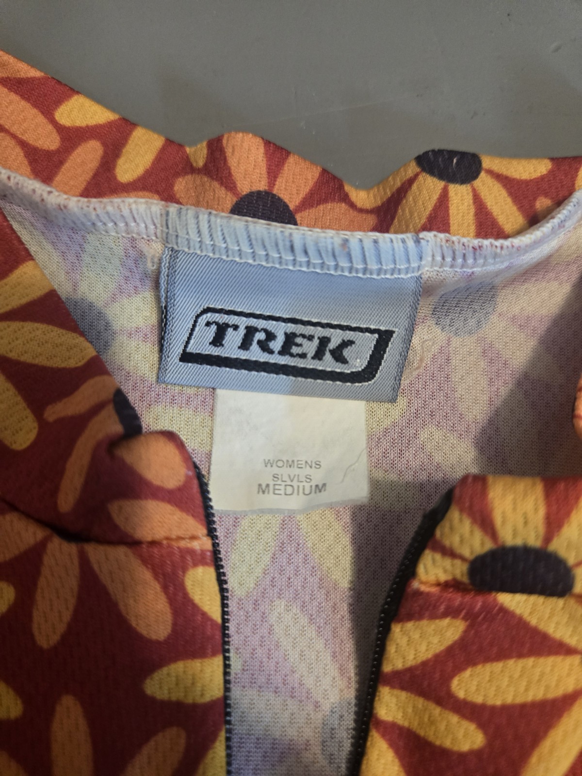 Trek Tec Women’s Cycling Jersey M Sleeveless Floral Orange 3/4 Zip Polyester