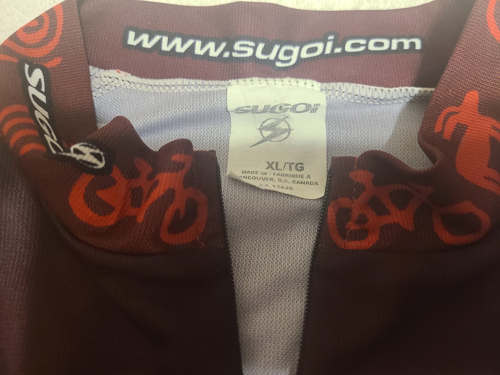 SUGOI Moab Cyclery Short Sleeve Multi-Color 3/4 Zipper Cycling Jersey – Men XL