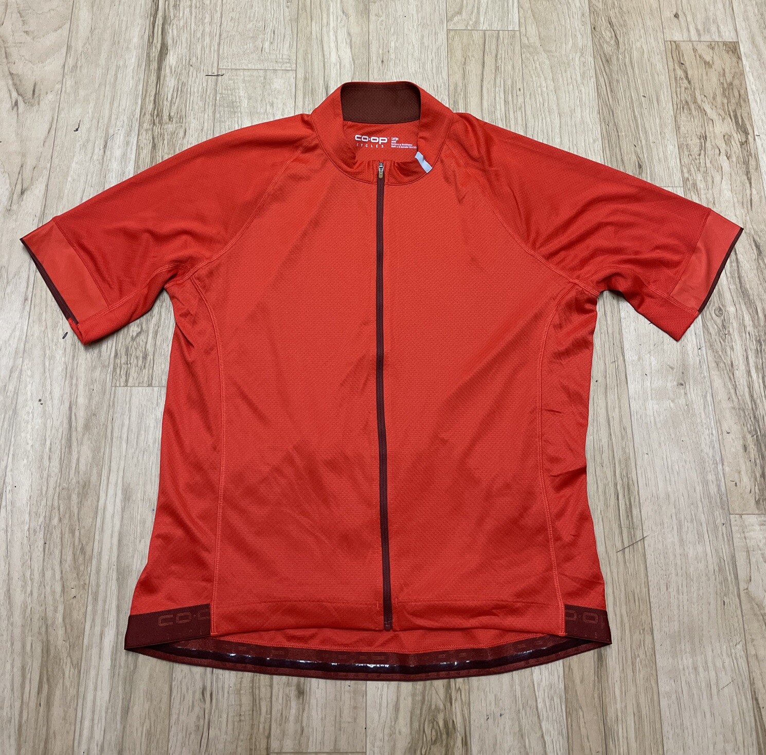 REI CO OP Cycles Men’s Large Orange Full Zip Road Jersey w/ Back Pockets