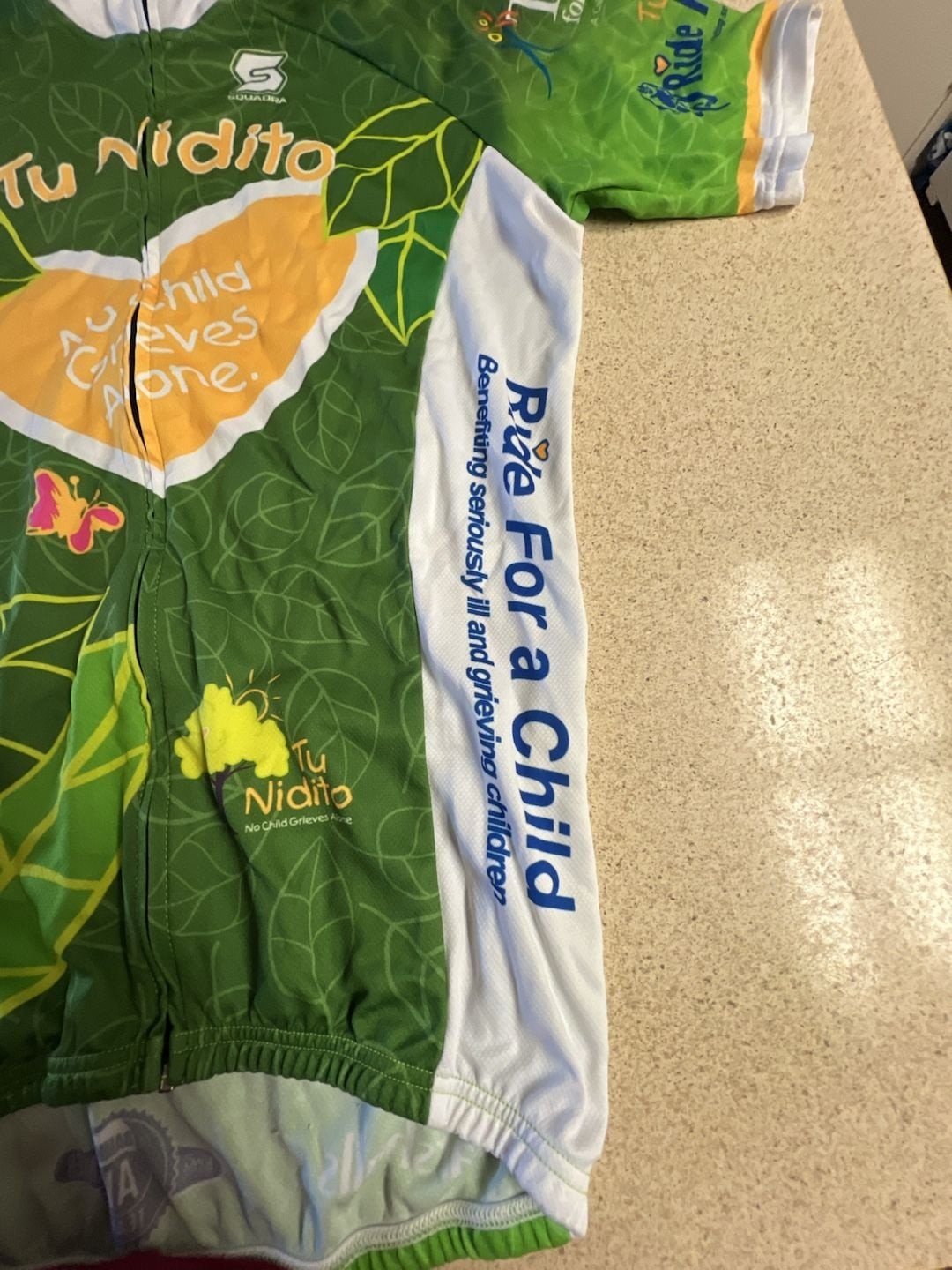 Squadra Tu Nidito Ride For A Child Cycling Jersey Green Full Zip