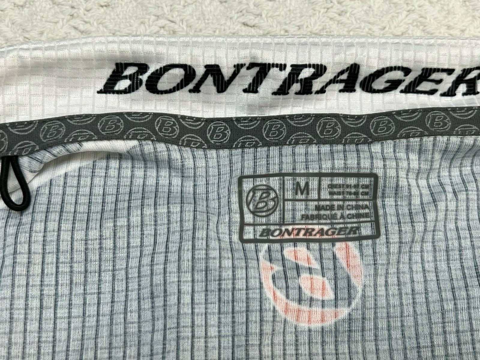 Bontrager Medium Full Zip Cycling Jersey Waist grippers S/S Reflective Pockets
