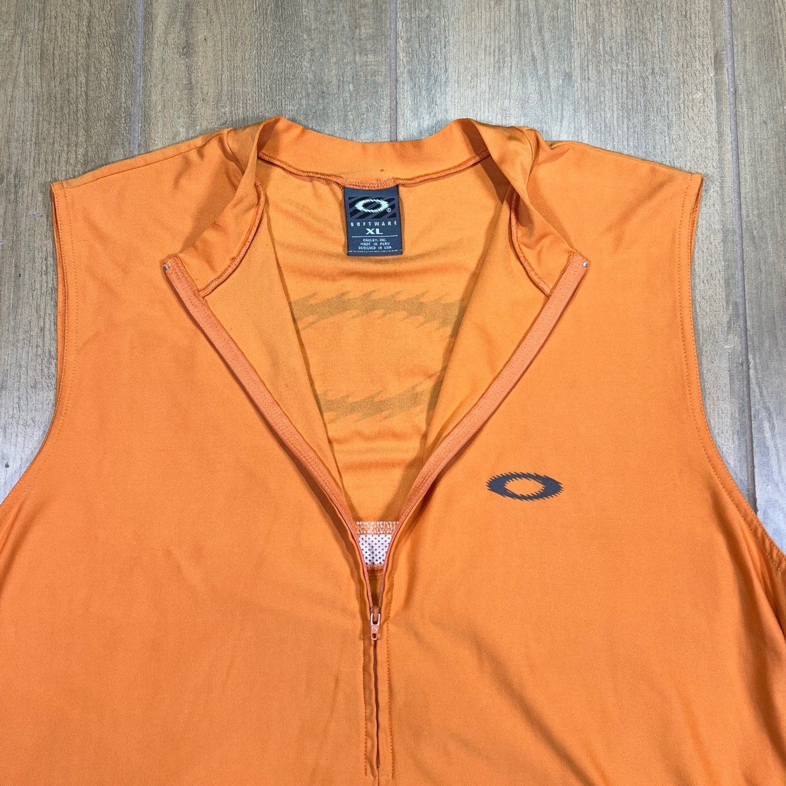 Oakley Software Mens XL Cycling Vest Orange Quarter Zip Sleeveless vintage