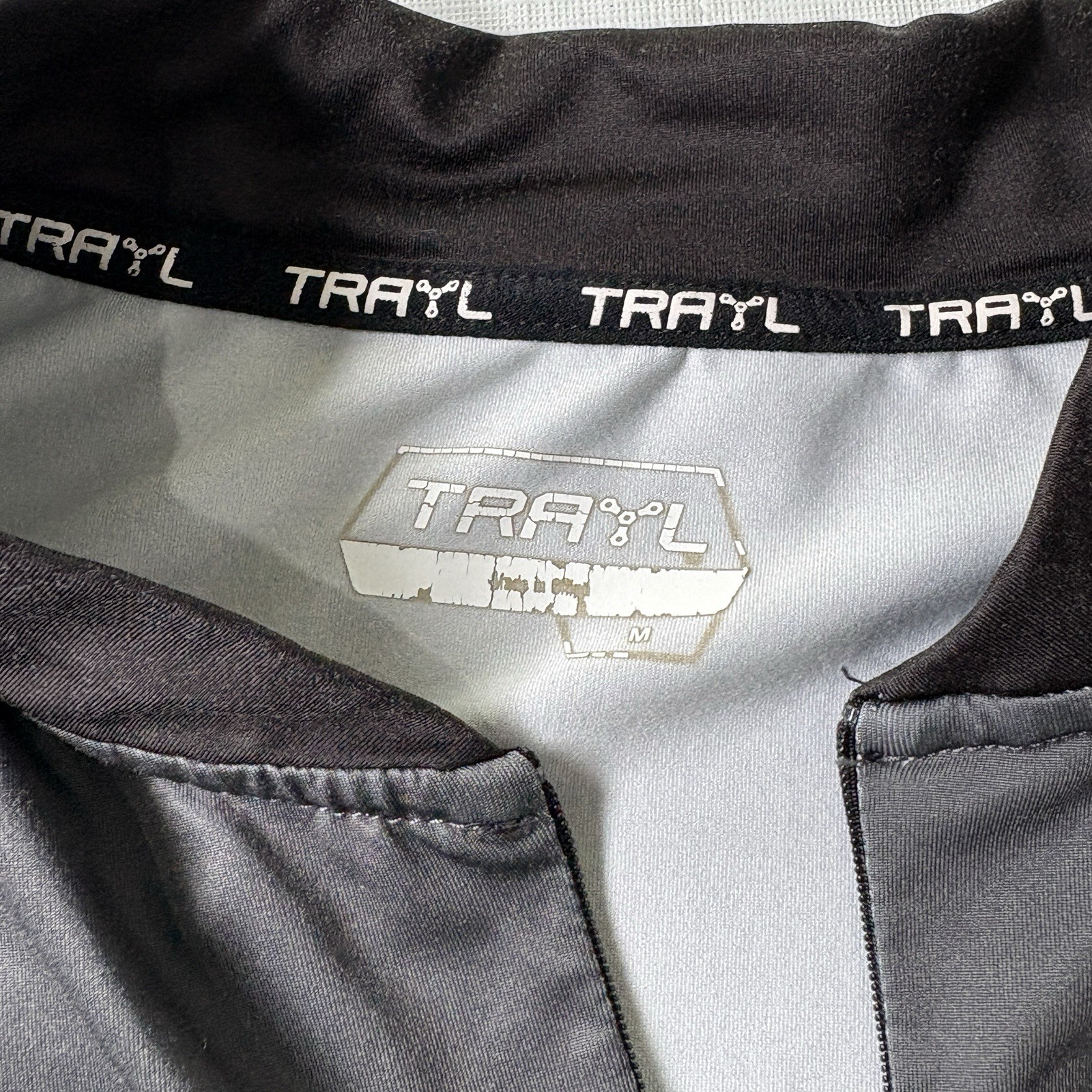 Trayl Bike Wear Cycling Men’s Jersey Size L Black Stripe Gray 1/2 Zip