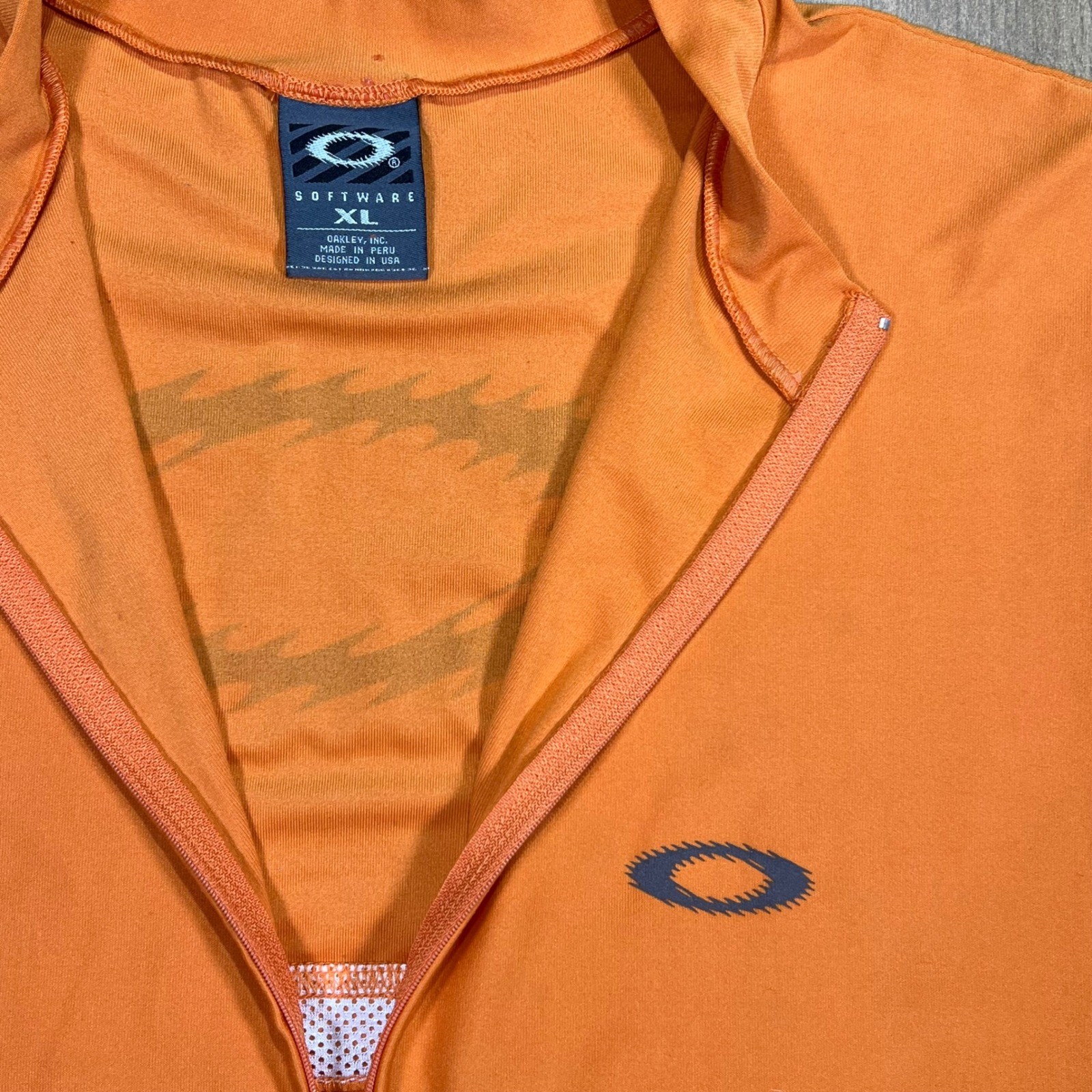 Oakley Software Mens XL Cycling Vest Orange Quarter Zip Sleeveless vintage