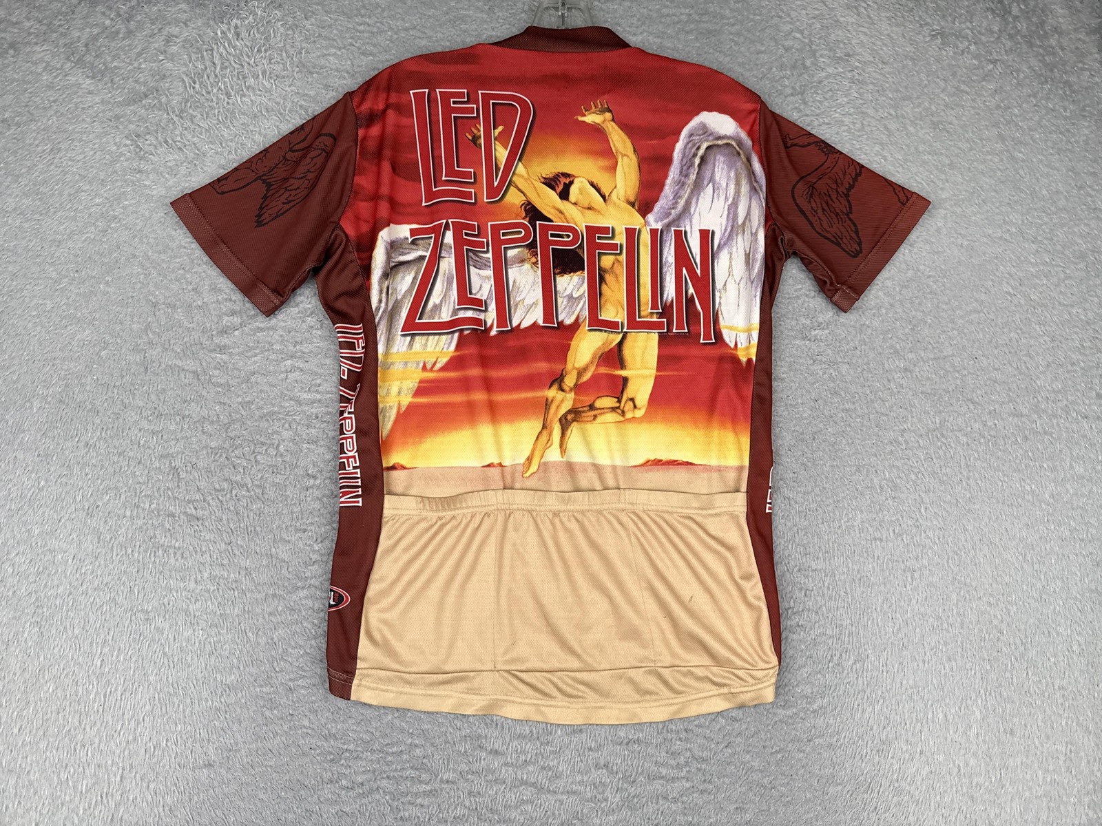 VINTAGE Primal Wear Led Zeppelin Cycling Jersey Mens Small Red Orange Half Zip