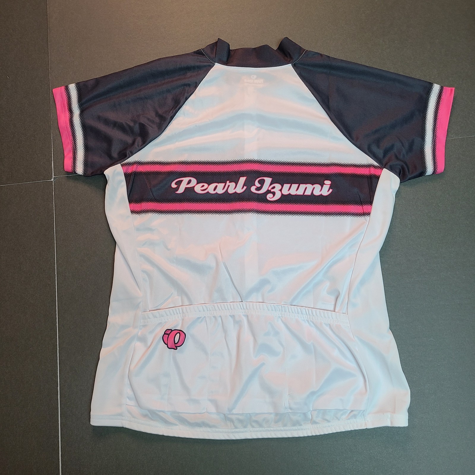 Women’s Pearl Izumi Cycling Jersey Size L White Spell Out SS Pockets 3/4 zip