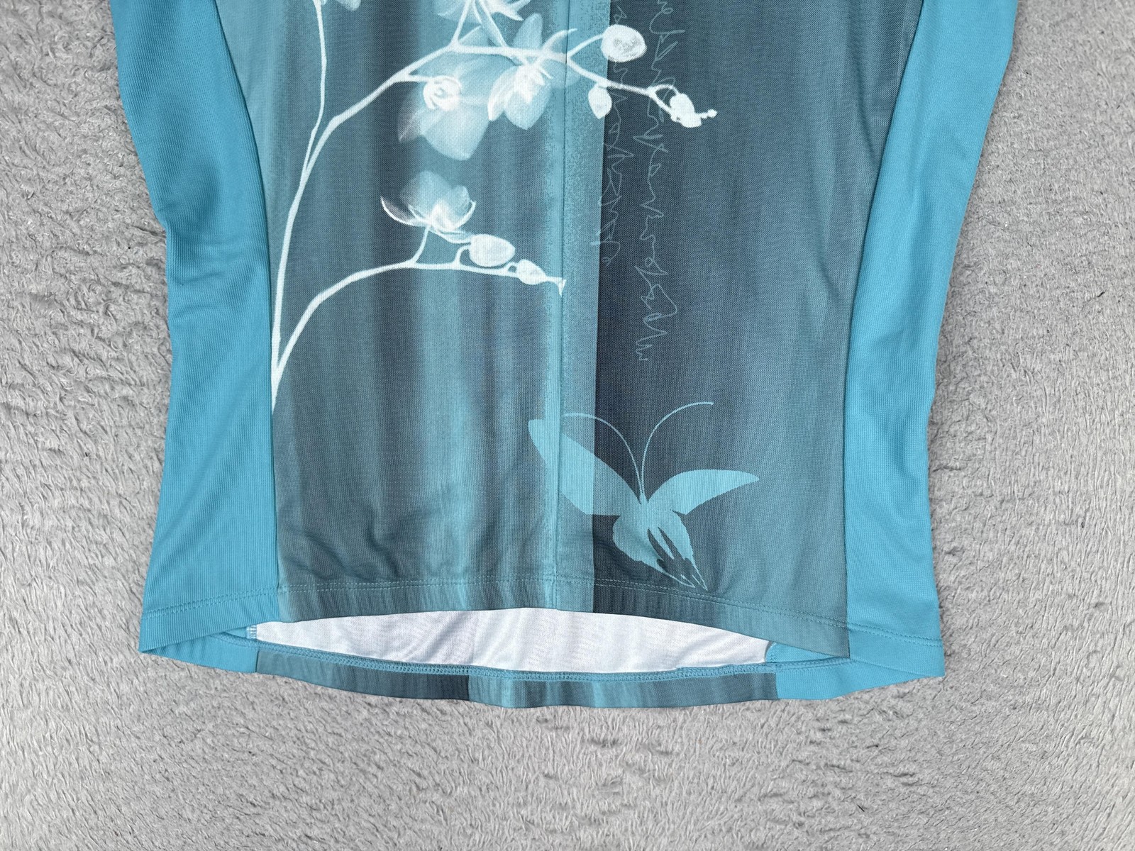 Sugoi Cycling Jersey Women Large Blue Floral Butterfly Tank 1/4 Zip Pockets Bike