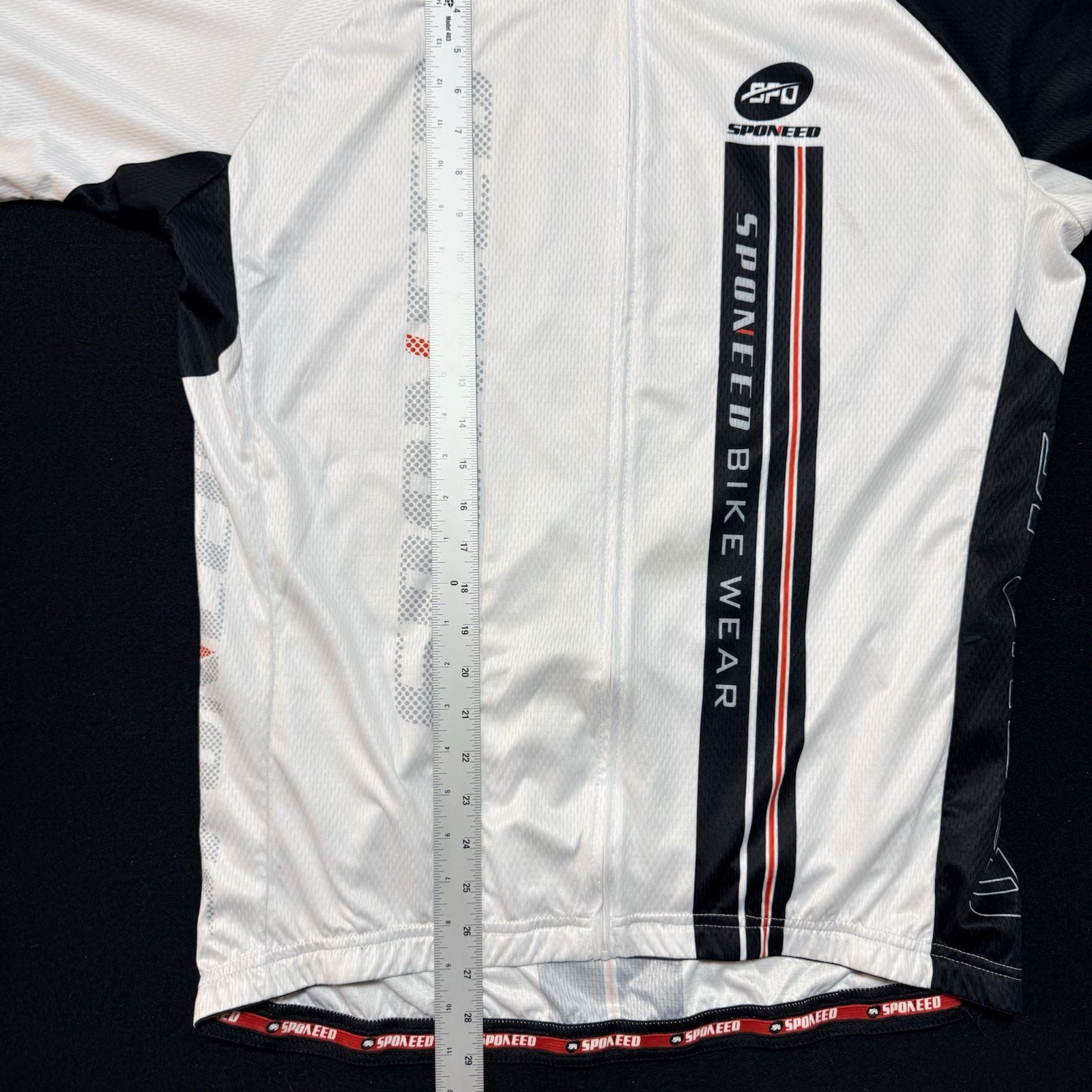 Sponeed brand cycling jersey is white with black and red accents XXL-XXXL