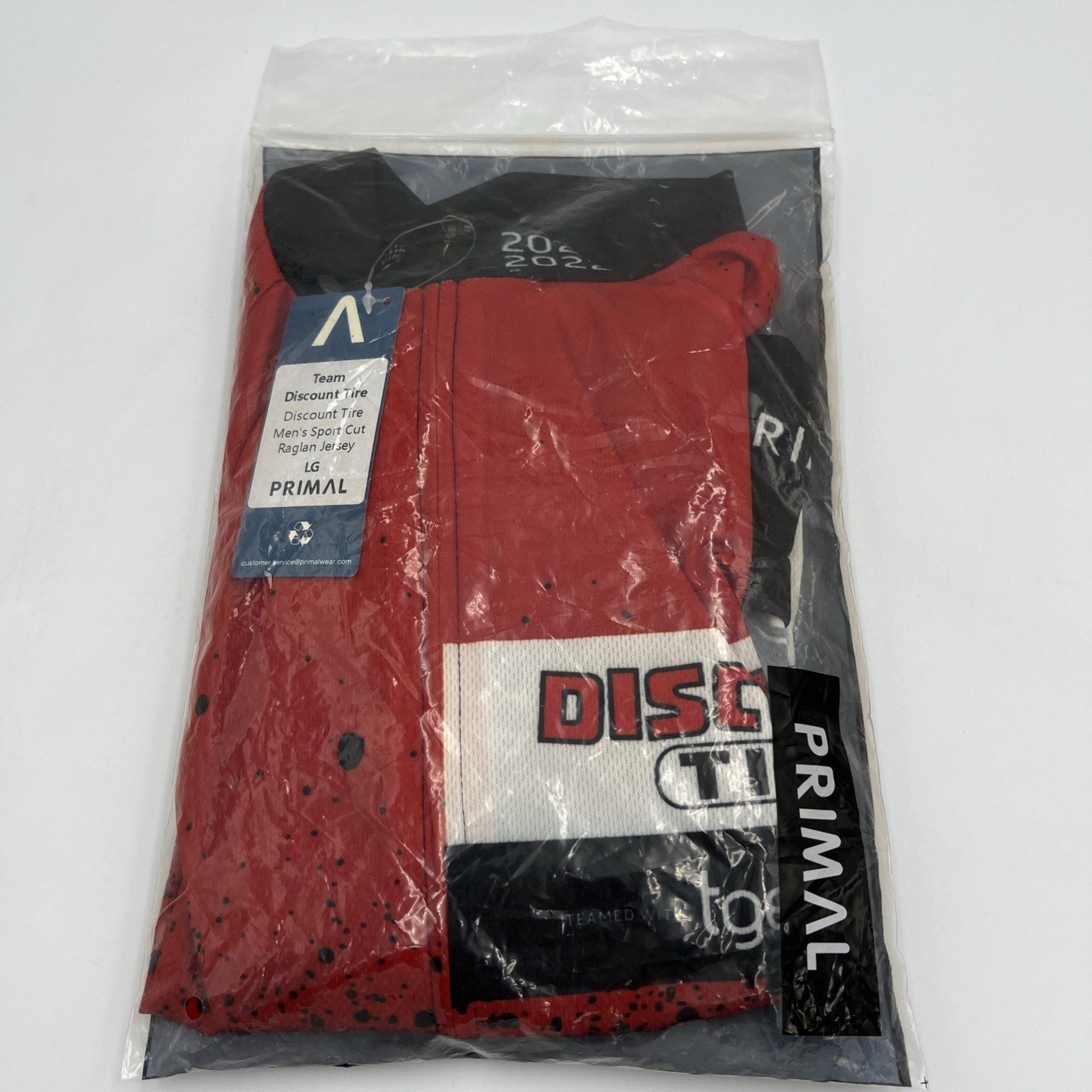 Discount Tire Cycling Jersey Mens L Red Primal Wear Michelin Man NWT 2021-22