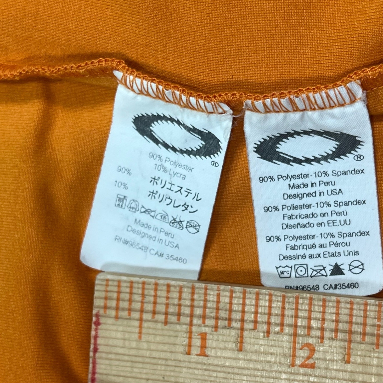 Oakley Software Mens XL Cycling Vest Orange Quarter Zip Sleeveless vintage