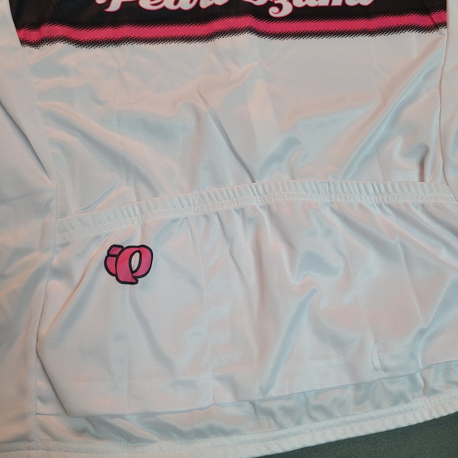 Women’s Pearl Izumi Cycling Jersey Size L White Spell Out SS Pockets 3/4 zip