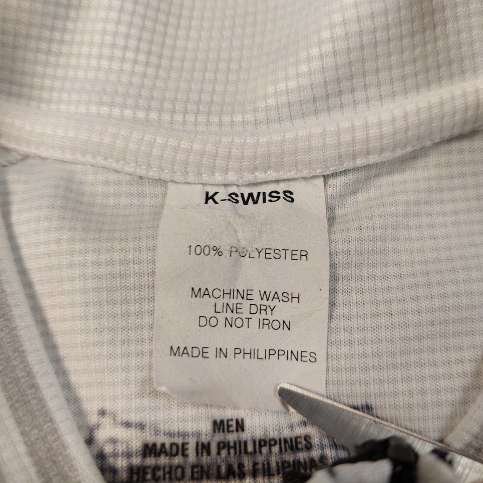 K-Swiss Cycling Jersey Men’s Size Large Pockets on back, Flaw/Stain on shoulder