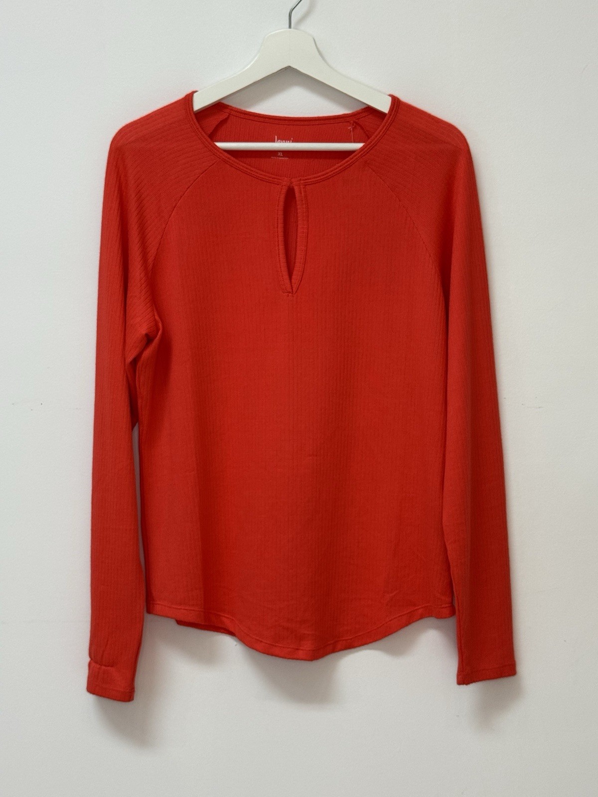 Red long sleeve top with keyhole neckline, soft ribbed fabric, casual chic.