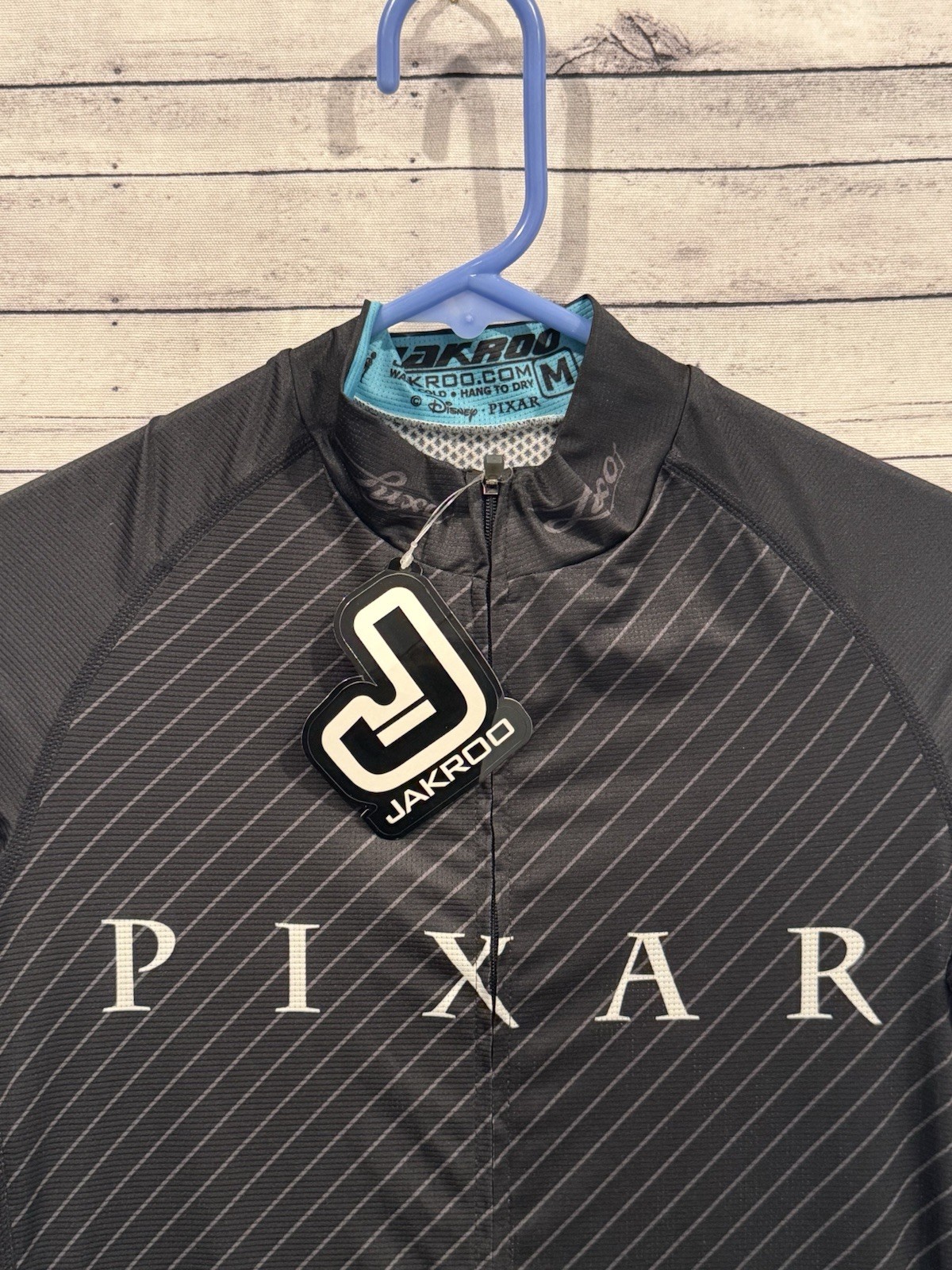 Jakroo x PIXAR Cycling Jersey M Black Blue Full Zip Lightweight Disney NEW NWT