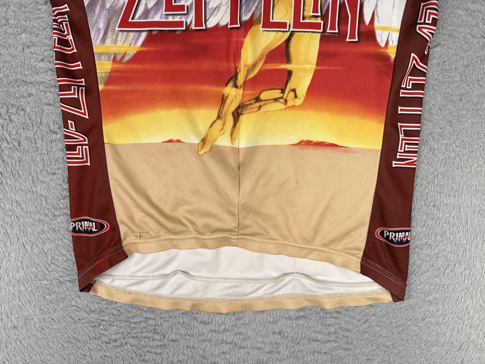 VINTAGE Primal Wear Led Zeppelin Cycling Jersey Mens Small Red Orange Half Zip